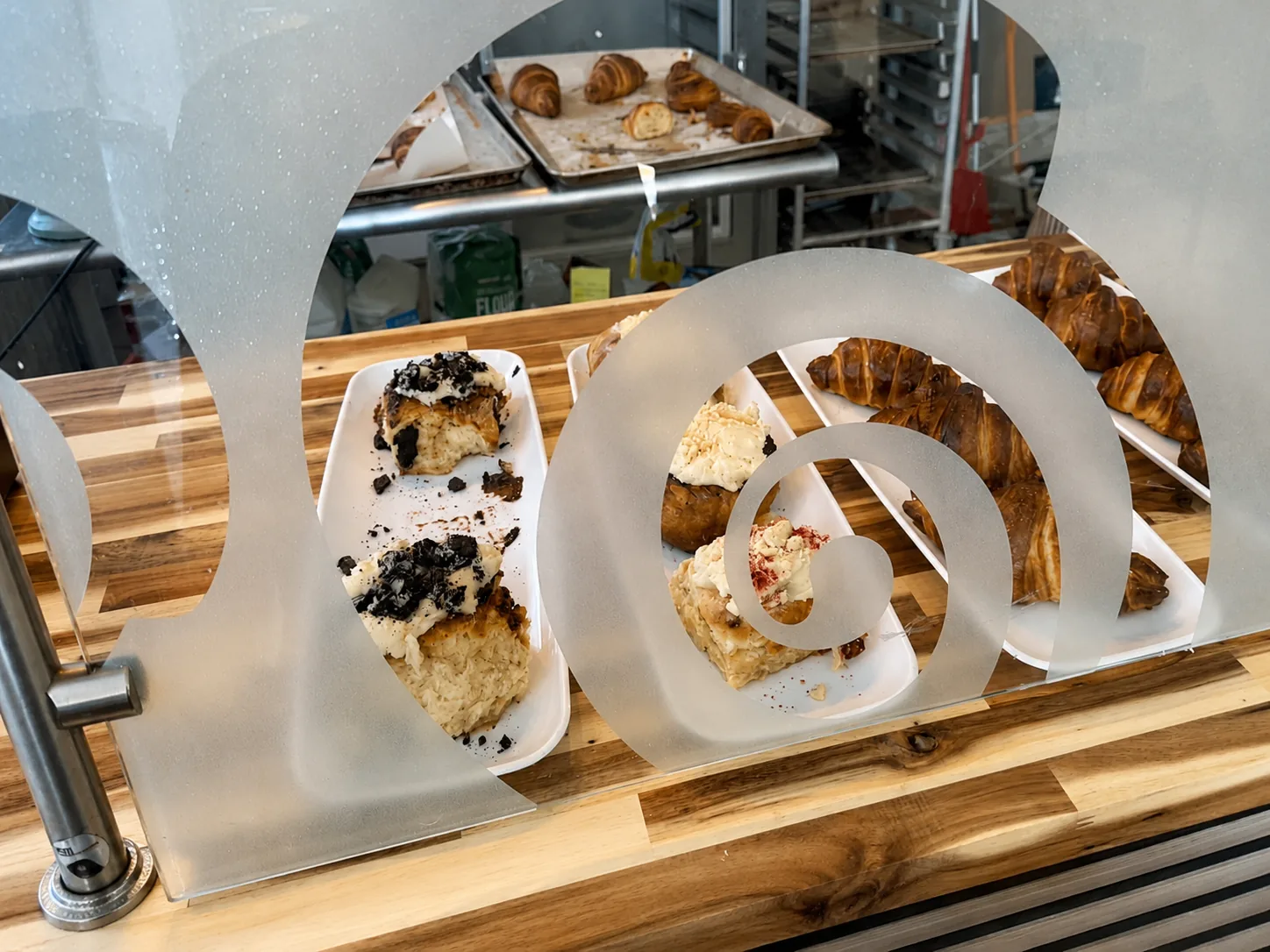 The pastry case at the bakery, full of fresh bakes